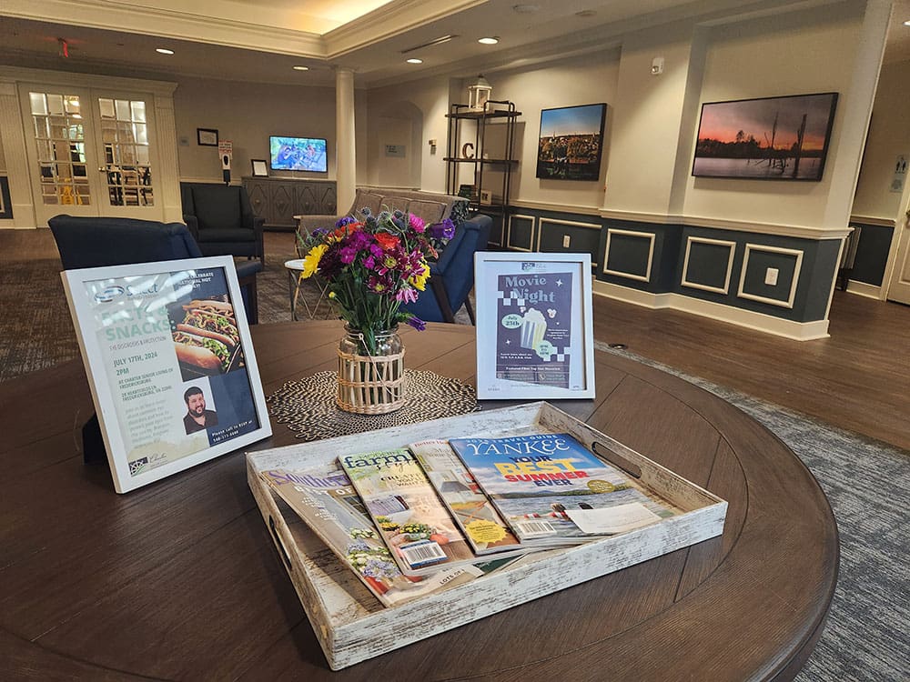 common area with seating, art work and magazines