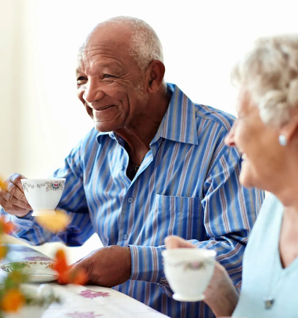 Senior couple enjoying tea together.